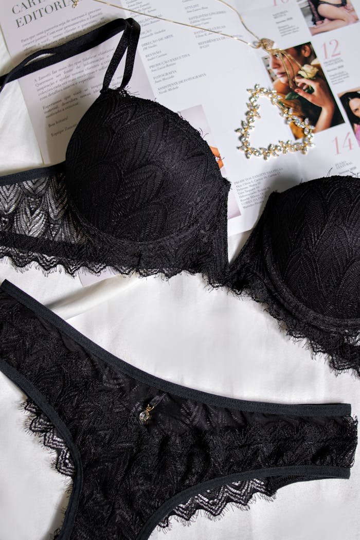Crafting Captivating Headlines: Your awesome post title goes here Elegant black lace lingerie set displayed beautifully on magazine pages, showcasing fashion and style.